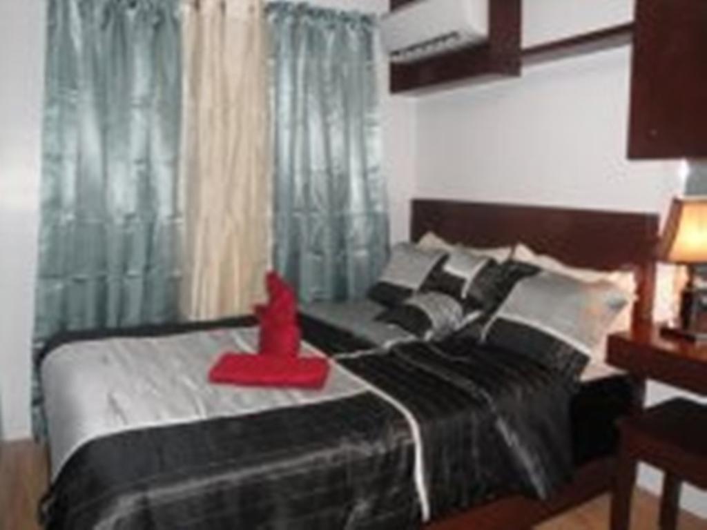 The Oasis Davao Condotel Стая снимка
